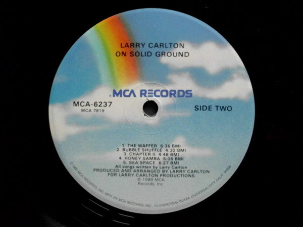 Larry Carlton : On Solid Ground (LP, Album, Glo)
