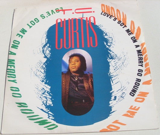 T.C. Curtis : Love's Got Me On A Merry Go Round (12", Single)