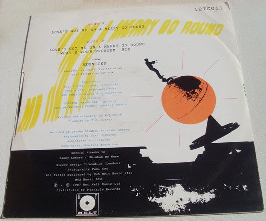 T.C. Curtis : Love's Got Me On A Merry Go Round (12", Single)