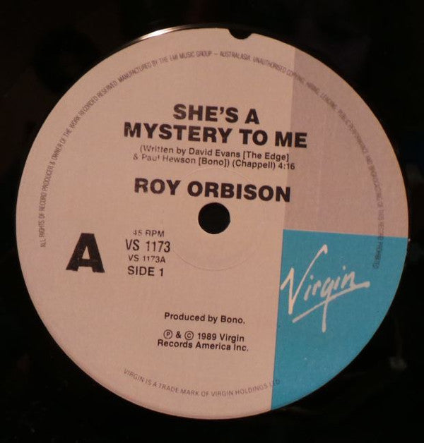 Roy Orbison : She's A Mystery To Me (7", Single, Ltd, Pos)