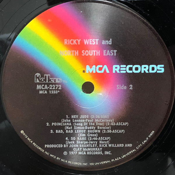 Ricky West : And North South East (LP, Album)