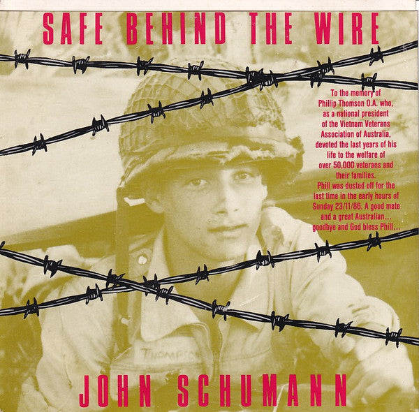 John Schumann : Safe Behind The Wire (7", Single)