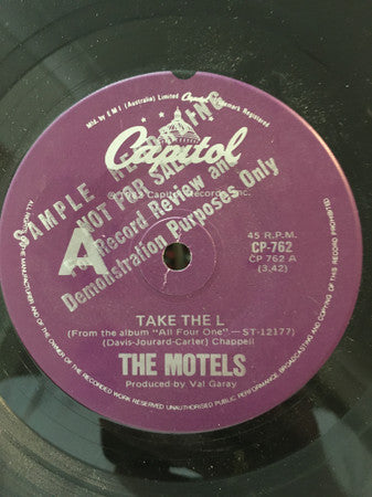 The Motels : Take The L / He Hit Me (And It Felt Like A Kiss) (7&quot;, Single, Promo)