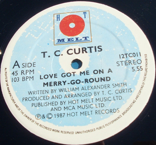 T.C. Curtis : Love's Got Me On A Merry Go Round (12", Single)
