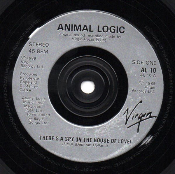 Animal Logic : There's A Spy (In The House Of Love) (7", Single)