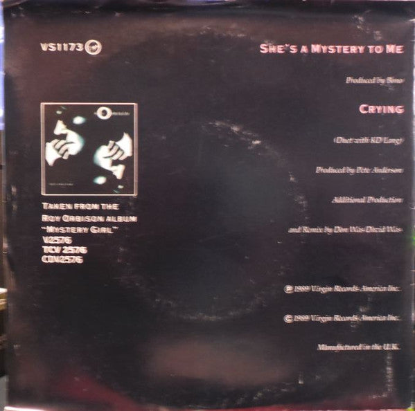 Roy Orbison : She's A Mystery To Me (7", Single, Ltd, Pos)