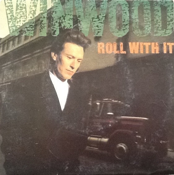 Steve Winwood : Roll With It (7", Single)